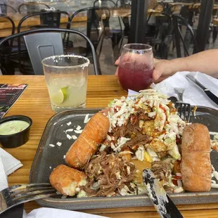 Tequeños, Arepa Cabimera, Margarita and Sangria.