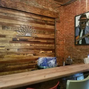 Beautiful artwork in upstairs bonus room that's available to rent! Bar area!