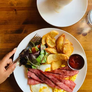 The Simple Breakfast - Eggs fried hard, Turkey bacon fries and salad... this was good !