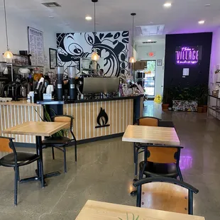 tables and chairs in a coffee shop