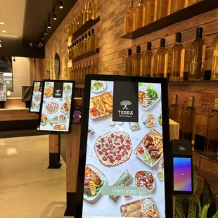 a digital menu board in a restaurant