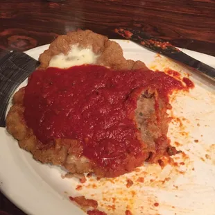 a slice of deep dish pizza on a plate