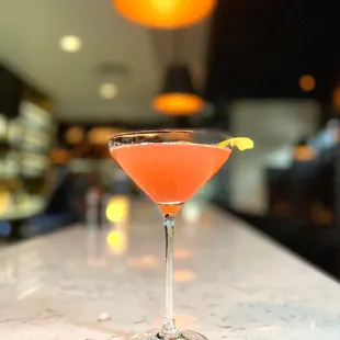 a cocktail in a martini glass