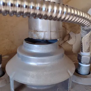 Hot water tank not hooked up to exhaust for gas connection.  Real smart.