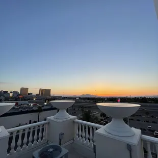 a view of a sunset from a balcony