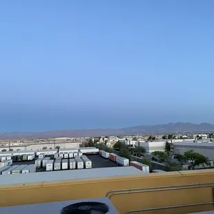 a view of a city from a rooftop