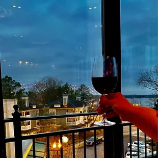 My friend holding her wine glass to the beautiful view!!