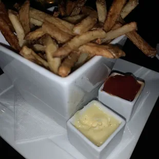 House cut French fries with truffle aioli and ketchup