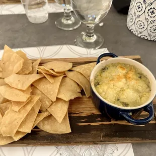 a bowl of soup and chips