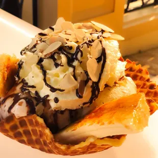 Who's with me? Vanilla n Chocolate ice cream caramel fired bananas topped with whip, nuts, and chocolate! How to Monday!!