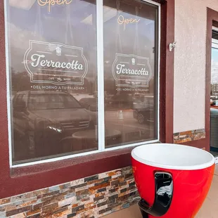a red beverage dispenser