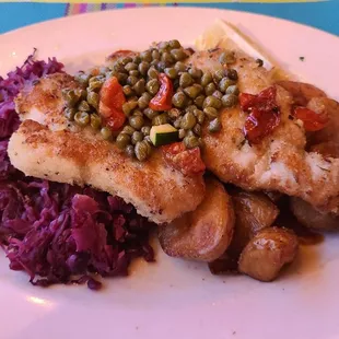 Porrk Schnitzel, with capers, red cabage and Yukon Gold potatos.