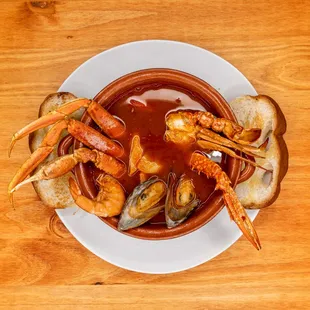 a bowl of shrimp and clams