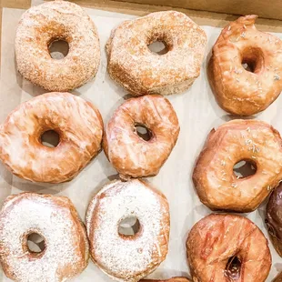 a variety of doughnuts in a box