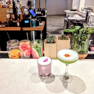 Cocktails at the bar during &quot;happiness hour&quot; - left to right: &quot;Nourish&quot; and the Cucumber Martini