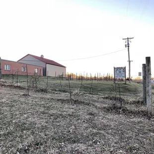 a red barn in the background