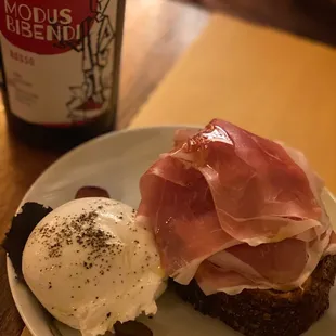 Burrata &quot;black truffle&quot; with Prosciutto Parma 24 Months and home made bread paired with natural wine.