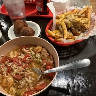 Jamabalaya with hush puppies and a side of poutine fries