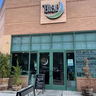 the front entrance of a restaurant