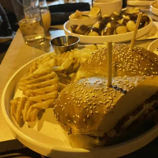 a sandwich and french fries on a plate
