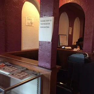 a woman sitting at a counter