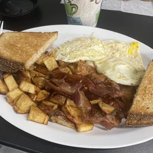 Bacon, eggs, potatoes and toast