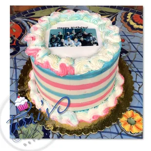 a cake with a picture of a family on it