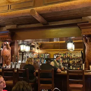 people sitting at the bar