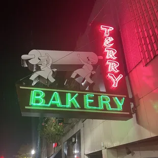 a neon sign for a bakery