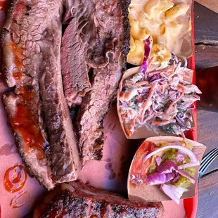 This tray was over $45 for 4 slices of brisket and 2 ribs and 2 small sides.