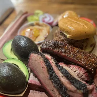 Brisket , pork rib, beef sandwich, peach cobbler , and avocado
