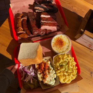 Pickles onions mac n cheese. Creamed corn. Sausage. Pork ribs. Brisket.