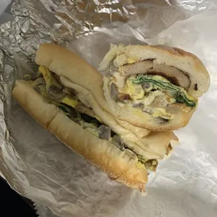 Mushroom, Spinach, Egg, Cheese, and Sausage on a Roll