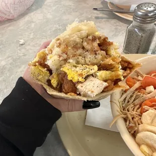 Breakfast burrito sub with crispy chicken tenders for the meat. Super delish and crispy hash browns:-)