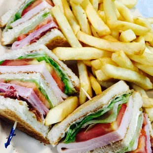 Delicious club sandwich on white bread