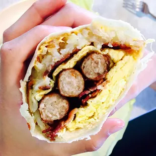 Sausage and bacon breakfast burrito! Huge!