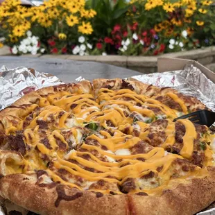 Philly cheesesteak pizza with American cheese stuffed crust.