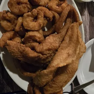 Shrimp fish combo. It was so good. Worth the trip . Portions are so big also