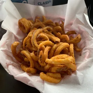 Basket of seasoned curly fries