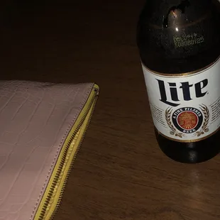 a bottle of lite beer on a table