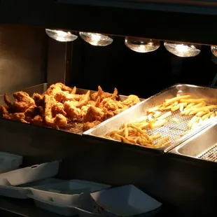 Freshly fried selection of fiah, chicken, fries, &amp; hush puppies ...