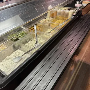 a buffet with a variety of food items