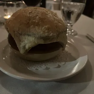Soup hidden under a bread bubble
