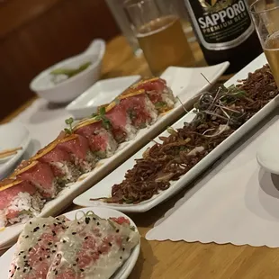a variety of sushi on a table