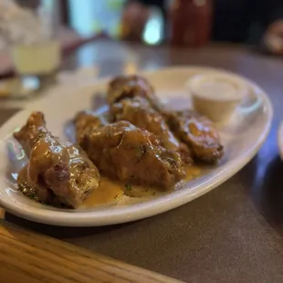 Wings with &quot;Magic Mustard&quot; sauce - it&apos;s an amazing sauce! Not on the menu but ask