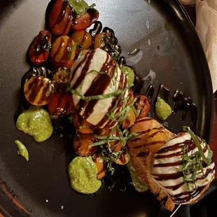 Caprese salad with burrata cheese. Delicious!