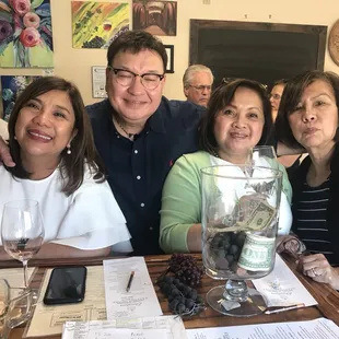 a group of people at a wine tasting