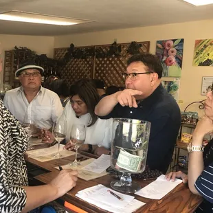 a group of people at a wine tasting