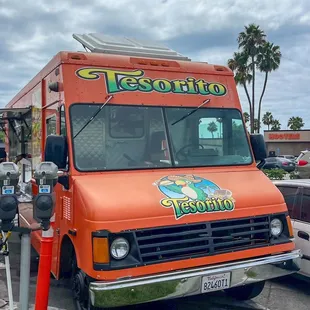 a food truck parked in a parking lot