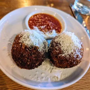 Arancini. $16. Risotto, salsa Calabrese.